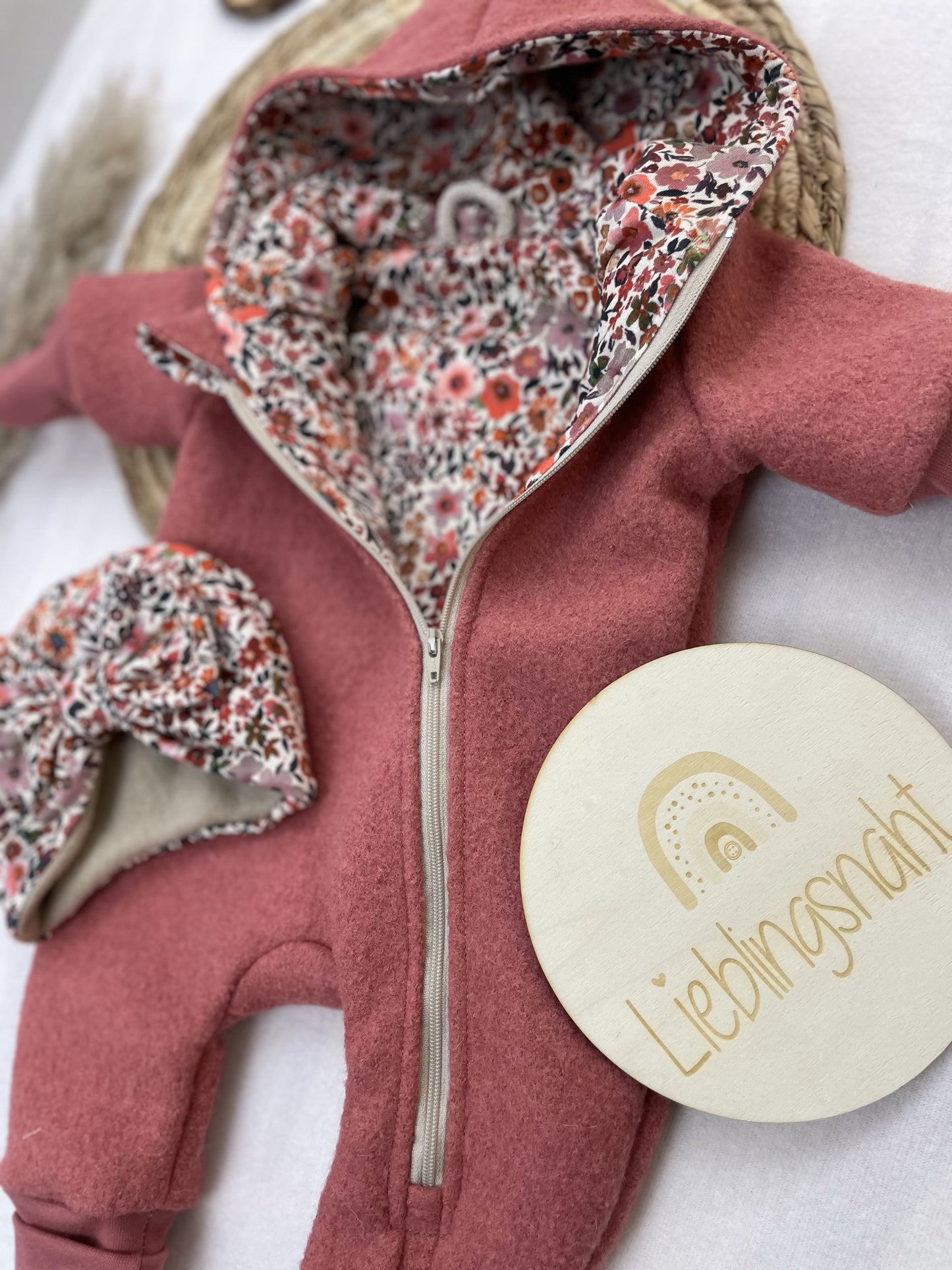 Wollwalkoverall Himbeere Rostblumen